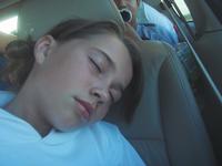 Emma falls asleep in the van