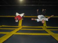 Alphonso and Dwight doing backflips at Skyhigh