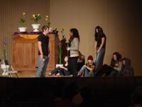 Joseph and Arielle performing a drama on Youth Sunday