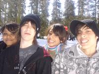 Arielle, Justin, Priscilla, and Andrew enjoying the snow