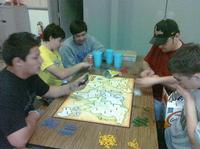Guys playing RISK at 3am.