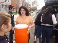 Savannah carrying the soup for the homeless