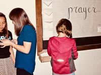 Ayla teaching Grace how to pray