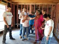 Our Hurricane Harvey team praying with a homeowner after gutting her house