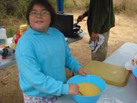 Chrysta helping make dinner