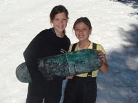 Ashley and Rachel boarding down the mountain