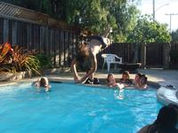 Josh doing the flying dive over the hot tub