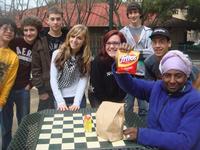 Handing out lunches and praying with the homeless in downtown San Jose