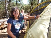 Athena helping build the girl's tent