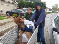 Collecting can food from the neighbors