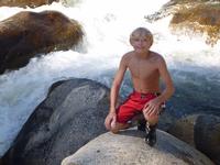 Ryan exploring the river and rocks