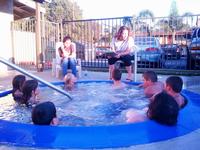 Pastor Jenny leading a lesson at the hot tub