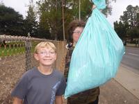 Ryan and Brandan picking up trash on Kiely