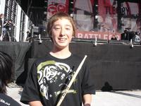 Jesse, holding Lori Peters drumstick