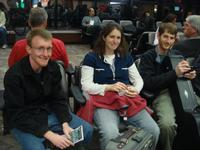 Tim, Rebecca, and Joel waiting for the plane