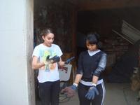 Crystal and Kristine trying to figure out how gloves work