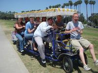 9 people on a little bike.  Watch out kids.