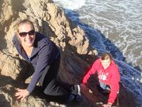 Danijela and Kim trapped on a rock while the tide is coming in