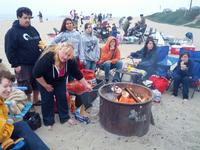 At Twin Lakes beach having a weenie roast