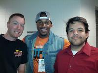 Matt and Will posing with Fred at the Sabercats game