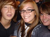 Jesse, Victoria, and Will enjoying the ballgame