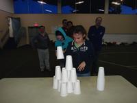 Carmen and Donya building their cup house