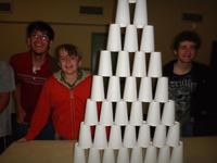 John, Matty, and Mark build the tallest cup house