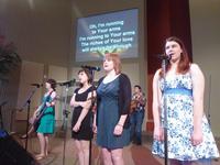 Carmen playing bass and our backup singers