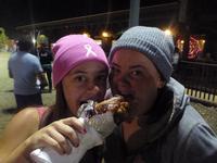 Kayla and Emily devour a turkey leg