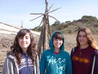 Camille, Carmen, and Hannah in front of our windmill